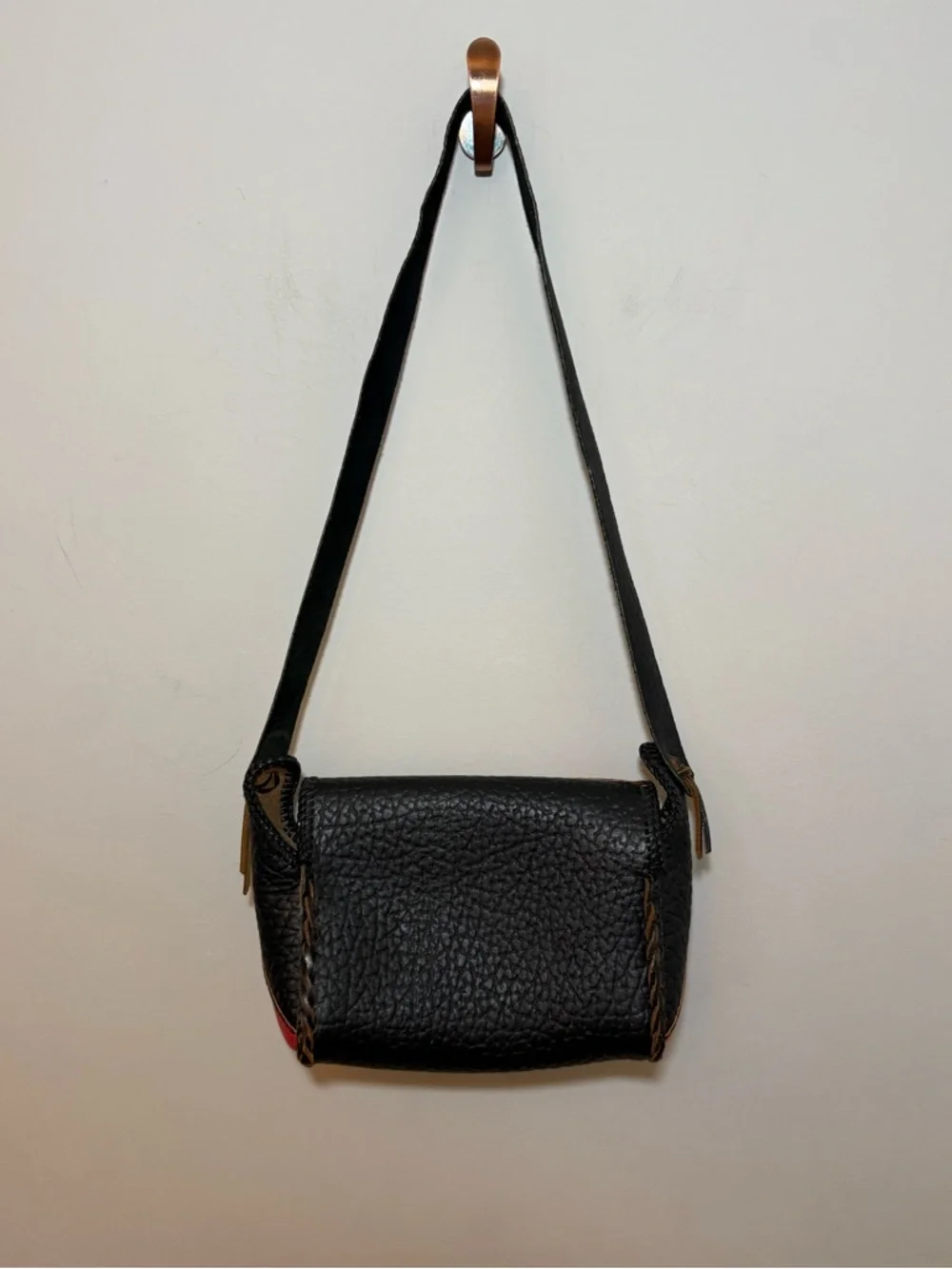 Vintage western leather black and red braided sides fringe shoulder bag purse.